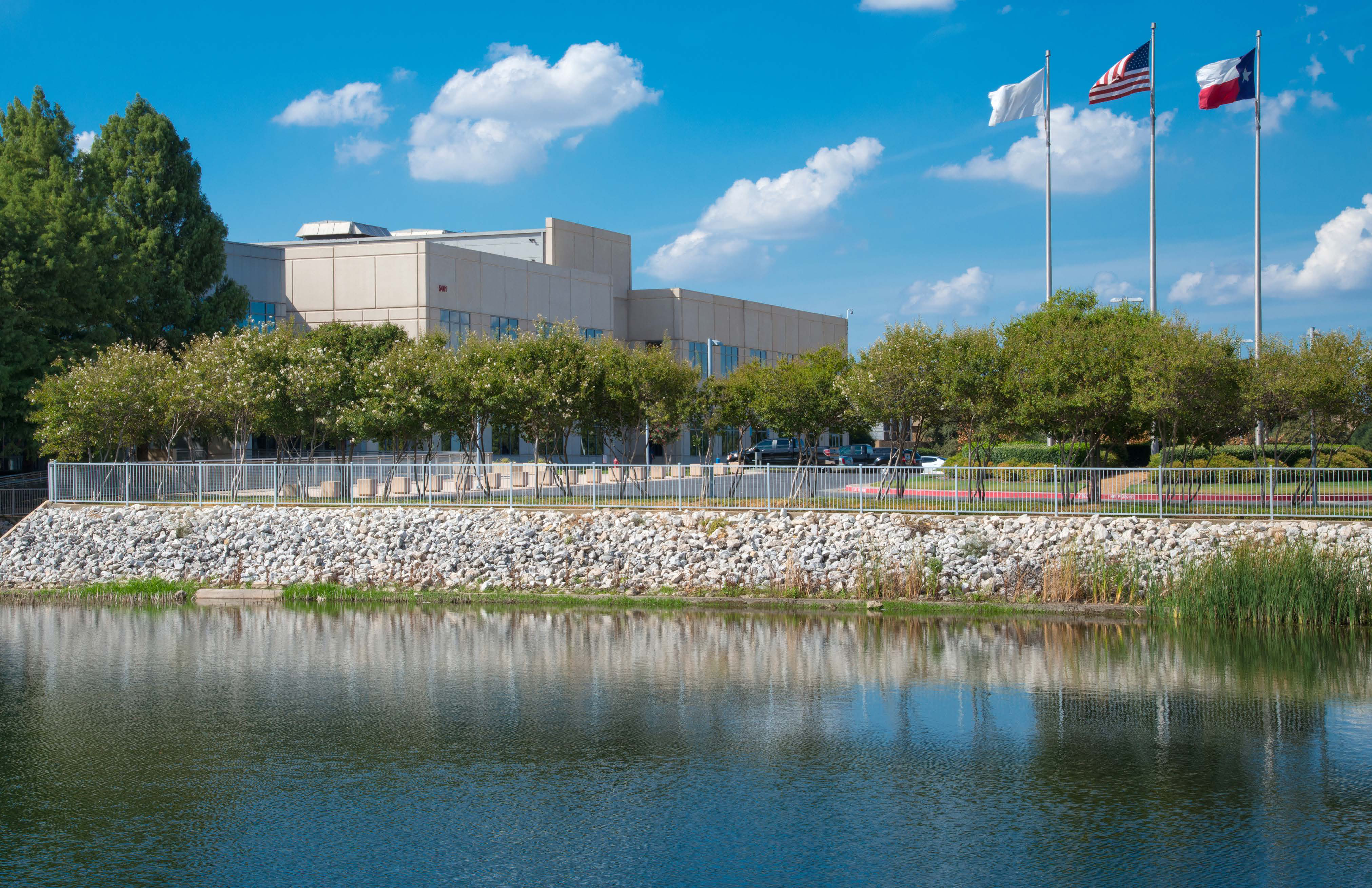 Lakefront frontage and monument entry at 5401 N Beach Street